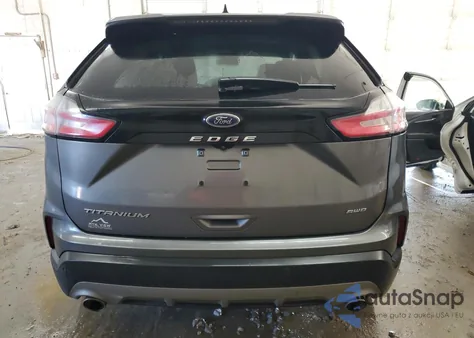 2022 Ford Edge Titanium z USA, uszkodzony, nr VIN 2FMPK4K95NBA13114